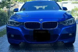 Blue BMW 320i 2014